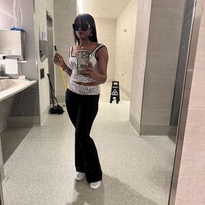 “Zebra Print Crop Top & Black Flare Pants chic,casual